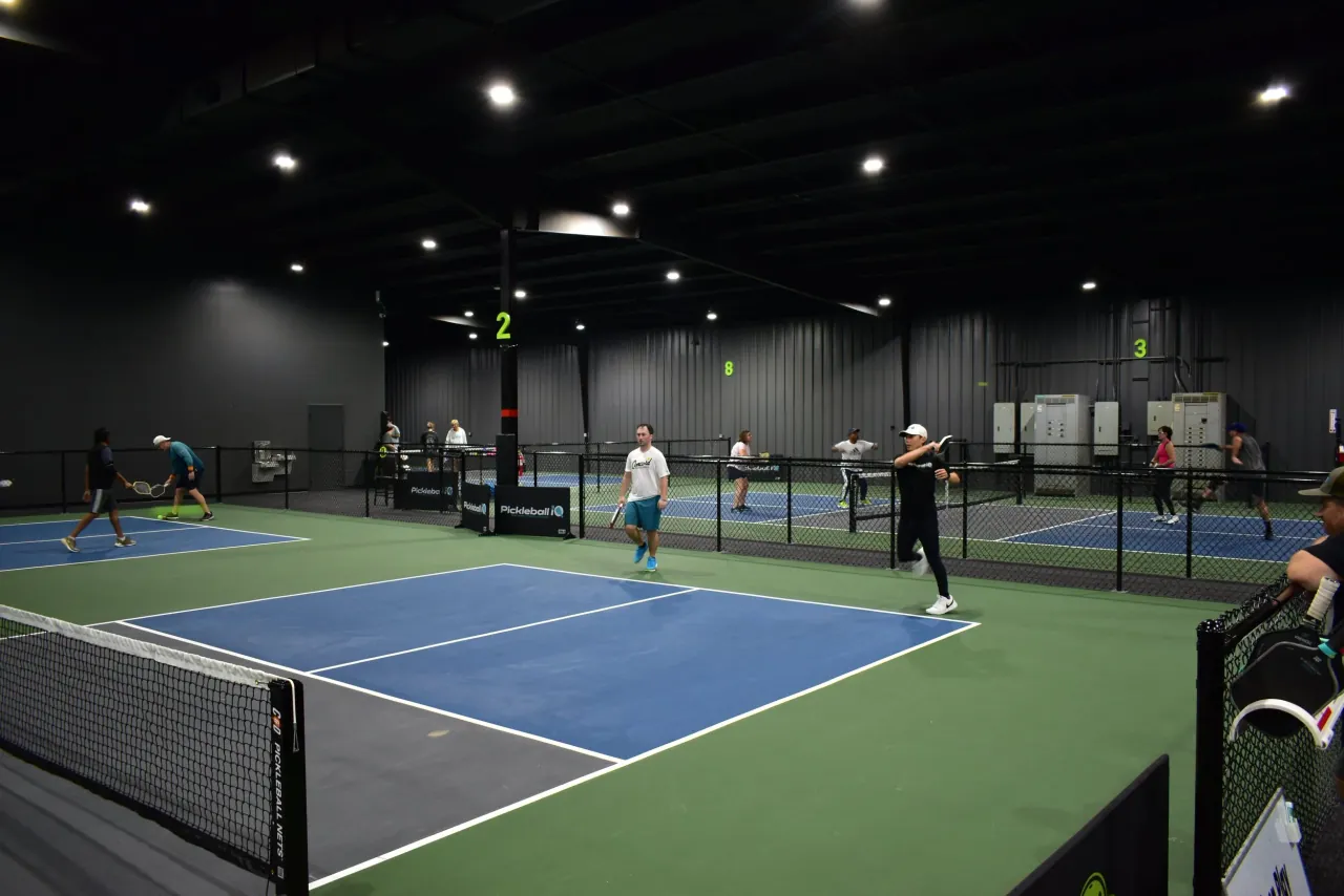 A full session across several Concord Pickleball indoor courts